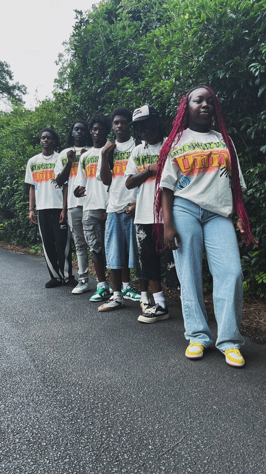 Uni1y Retro Street Tee group on steps with bags